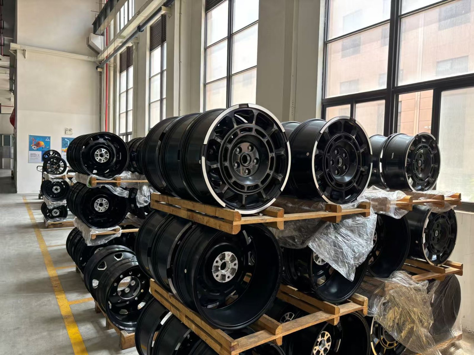Warehouse racks of finished black wheels