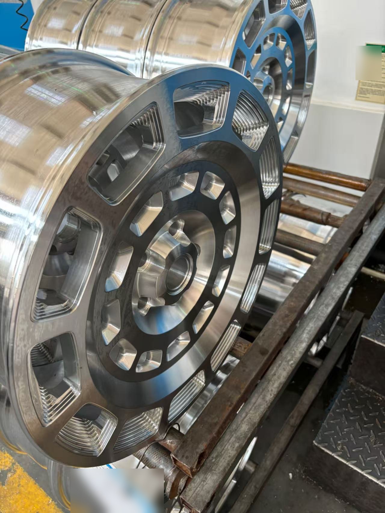 Machined wheel centers on the conveyor
