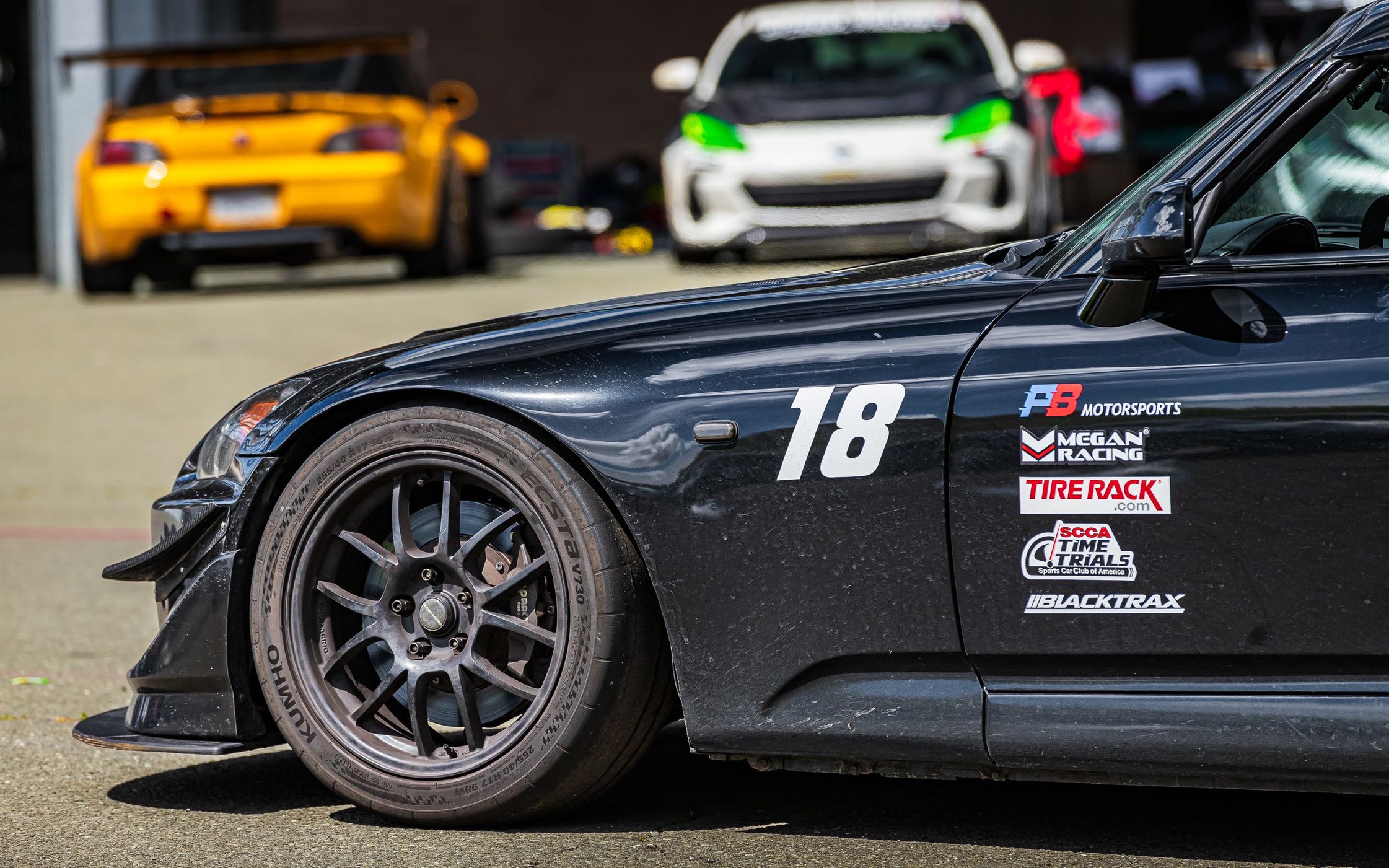 The PB Powertrains S2000 #18 in the paddock, wearing PB Motorports livery